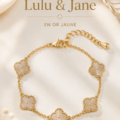 Le bracelet Lulu & Jane en doré sur un fond neutre, reflet élégant et moderne.