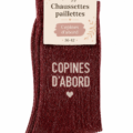 Chaussettes paillettes Felizz colorées présentées sur un fond clair, ajoutant une touche glamour à la mode féminine.
