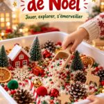 Un bac sensoriel de Noël rempli de décorations et d'éléments festifs pour les enfants.