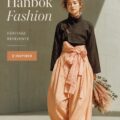 Femme élégante portant un Hanbok moderne lors d'un événement festif.